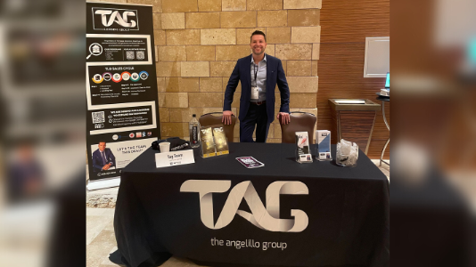 Anthony Angelillo at the TAG exhibitor table
