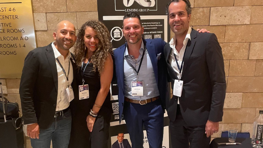 The TAG team with partners at an industry event